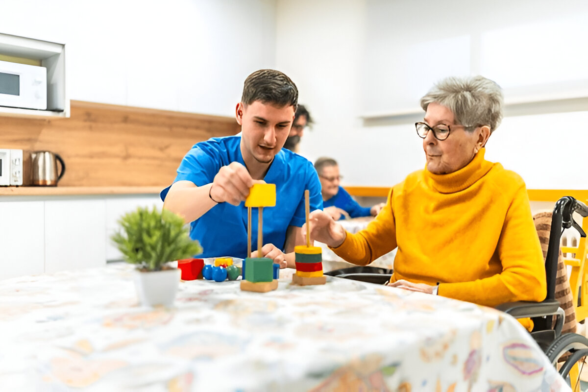 Disability support worker helping build confidence in daily life through NDIS assistance