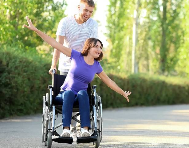 Good Care staff helping with mobility equipment – NDIS Registered Provider Victoria