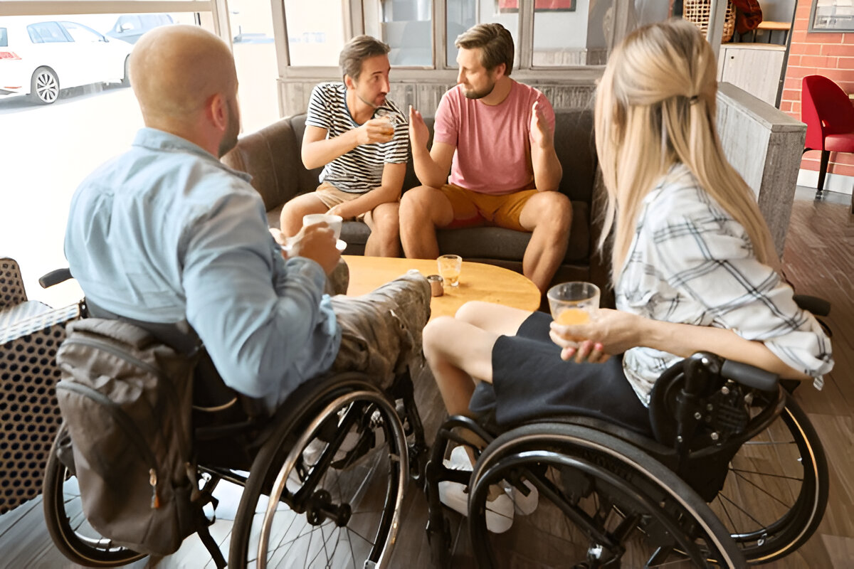 Support worker helping with meal preparation in a shared living arrangement in Mitchell